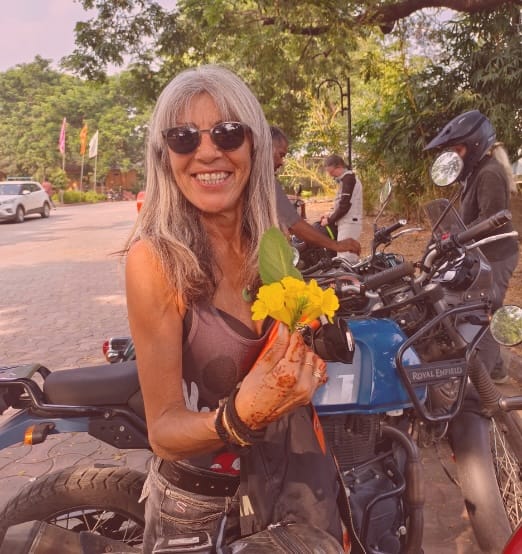 Sandrine Duong Women cheering on motorcycles in the mountains