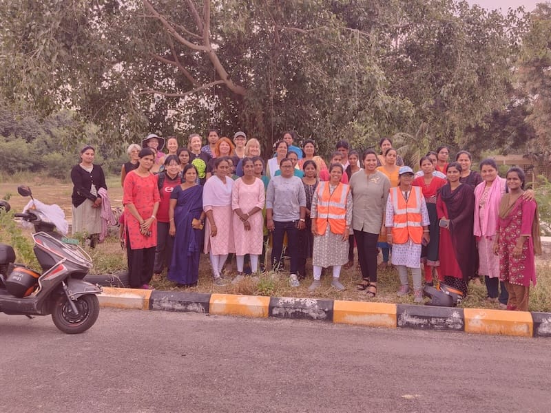 Social impact India Women cheering on motorcycles in the mountains