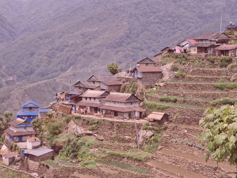 making a social impact Women cheering on motorcycles in the mountains