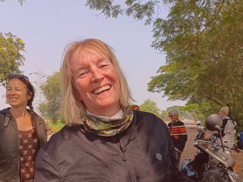 Sigrid Women cheering on motorcycles in the mountains